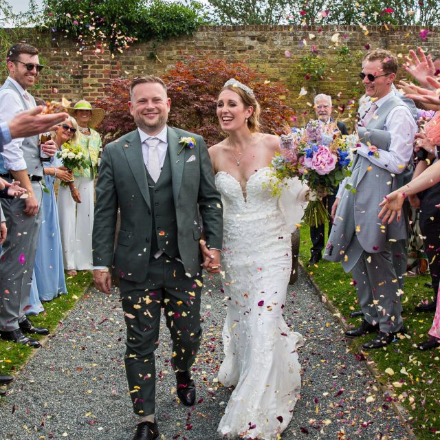 Lara & Will 🤍  Part 3 | The Celebration ✨  After the emotion of the morning, everyone headed to the beautiful Walled Gardens for a second ceremony and an evening of celebrations.  Officiated by Lara’s brother, this ceremony couldn’t have been more different. Relaxed, full of laughter, heartfelt readings and plenty of personality, it was the perfect reflection of Lara & Will and such a lovely way to celebrate with all of their family and friends.  From the sunshine and garden games to the speeches, dancing and everything in between, it was the most wonderful way to end an unforgettable day.  Congratulations again, Lara & Will, and thank you for trusting me to capture every chapter of your story. 🤍  📍 Venues: @stiffordhallhotel @langtonshouse @walledgardenevents @walledgardenupminster 
💇 Hair & Makeup: @justaboutweddingshair_beauty
💐 Florist: @theflowerdesigner1
🎧 DJ: @tonywinyardentertainment
🍽 Caterers: @plentyofthymecatering
🍸 Bar: @bartinibarhire
👗 Dress: @bridalshopromford
🎂 Cake: @familycaketree 
🎲 Garden Games: @thegiantgardengameshirecompany  #essexweddingphotographer #essexwedding #hiddengemweddingvenue #uniquewedding #londonweddingphotographer